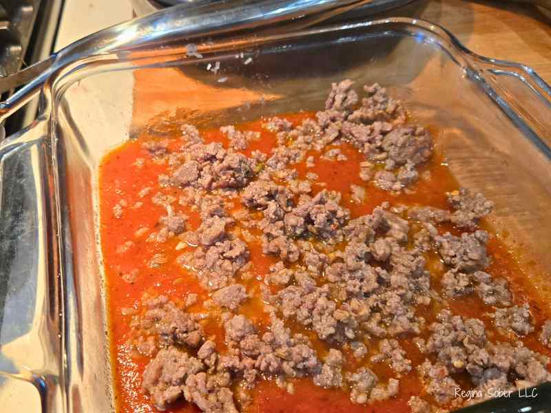 italian sausage and ground beef with tomato sauce