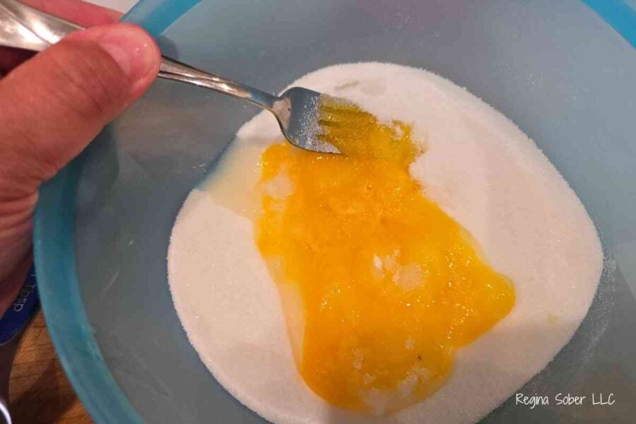 mixing eggs and sugar together until eggs are light