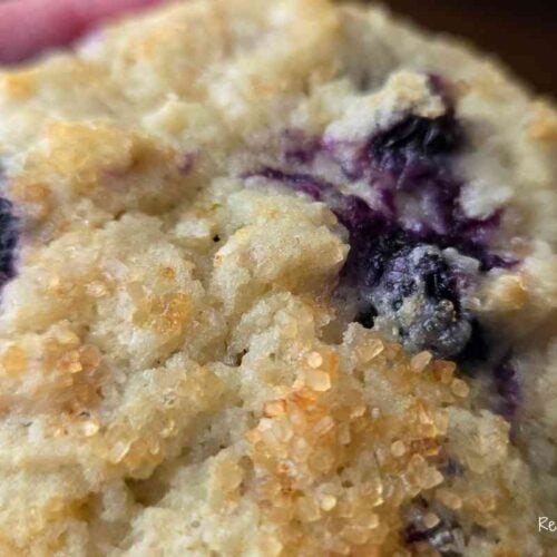 lemon blueberry muffin with raw sugar on top for a crispy top