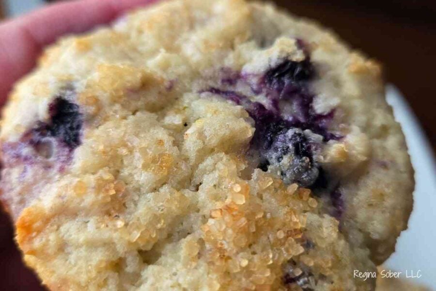 lemon blueberry muffin with raw sugar on top for a crispy top