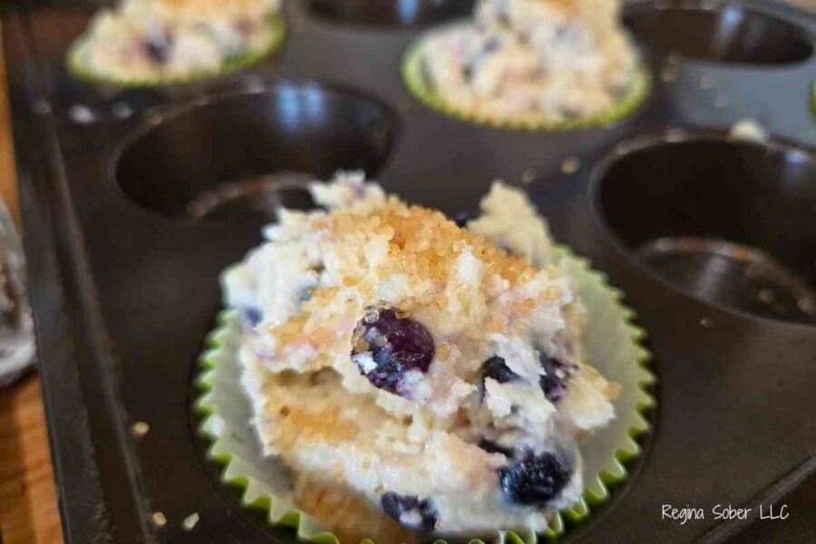 top the muffins with raw sugar creates a sweet crunchy top