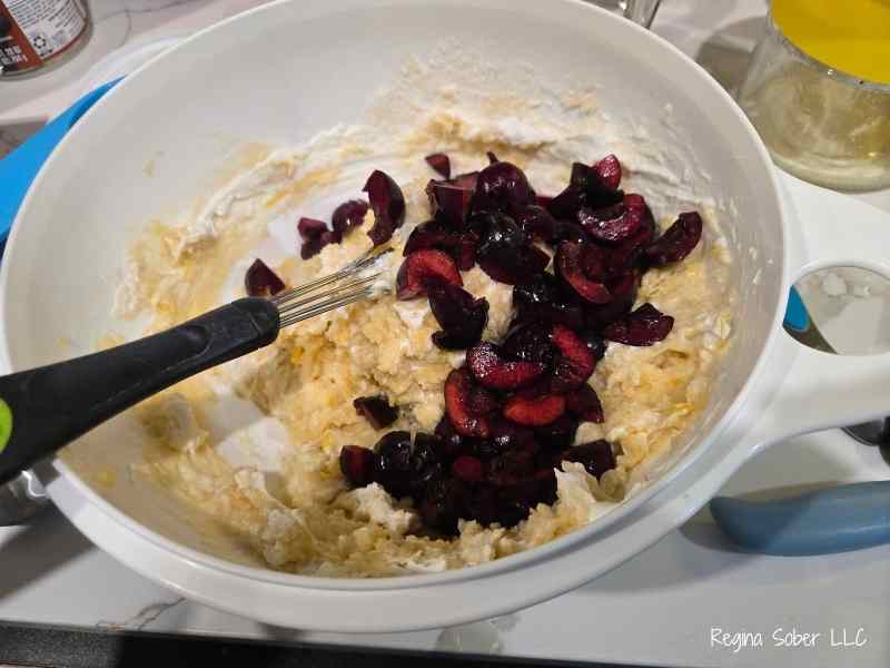 quatered cherries allows the cherries to go into every corner of the muffins