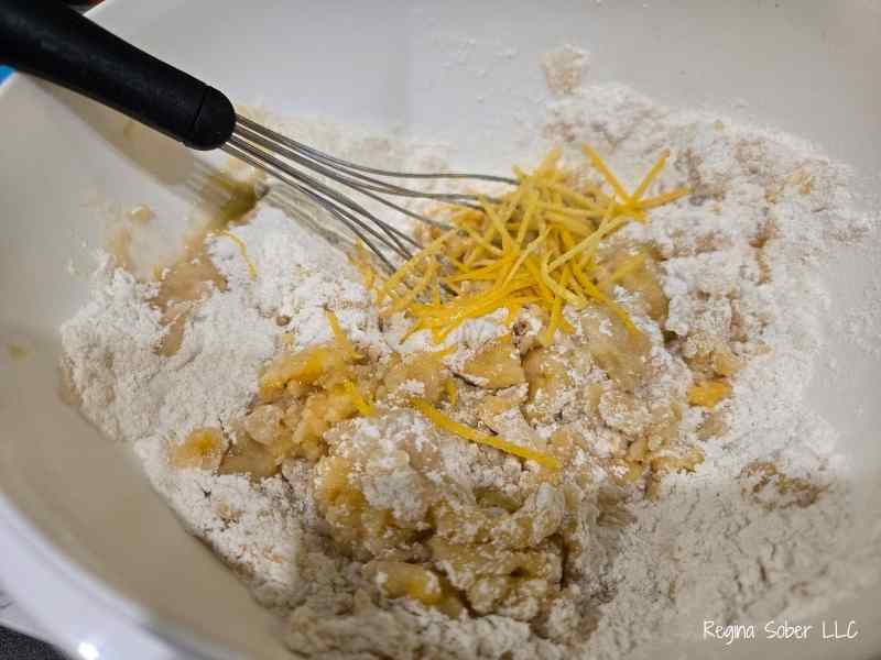 lemon zest and egg mixed into batter