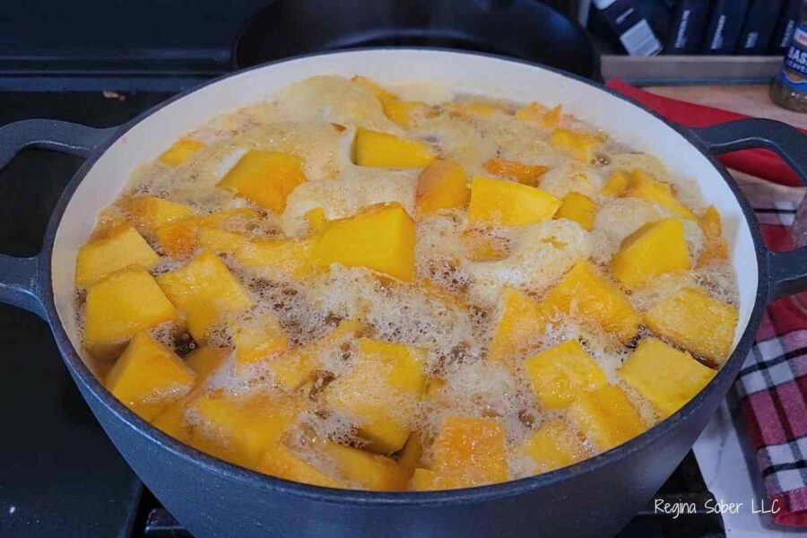 dutch oven filled with cubed pumpkin
