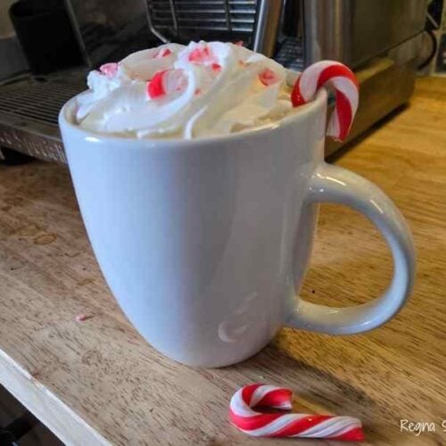 perfect cup of peppermint coffee topped with whipped cream and of course, peppermint sprinkles