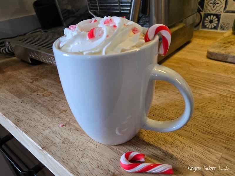 perfect cup of peppermint coffee topped with whipped cream and of course, peppermint sprinkles