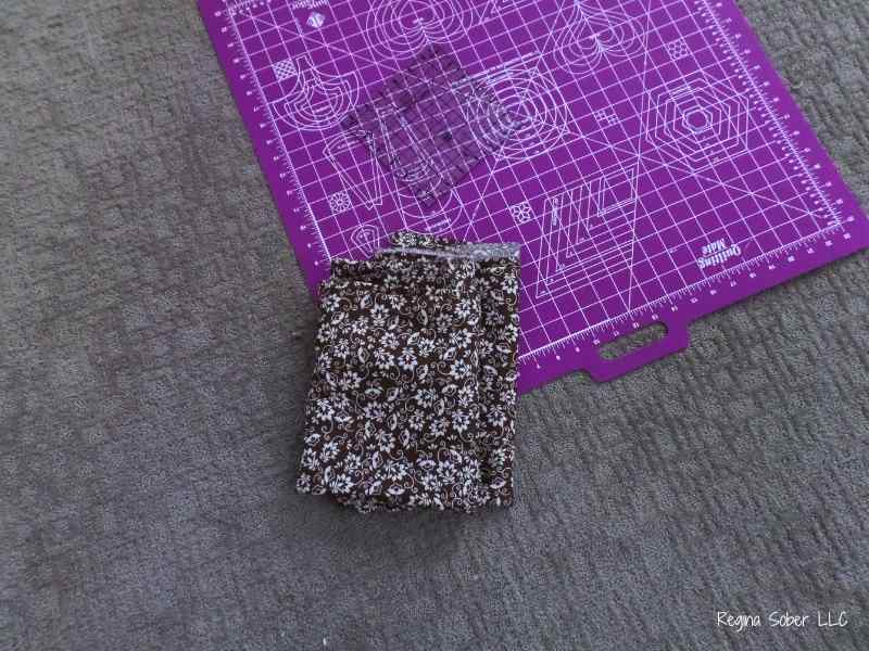 cutting mat, fabric and cutting edge