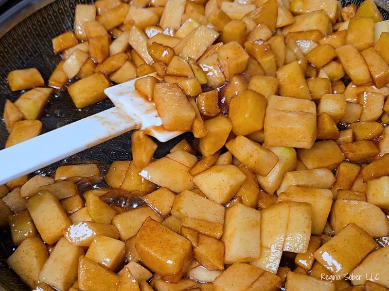cooking fresh cinnamon apples in brown sugar