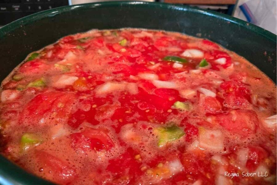 tomatoes cooked down and boiling