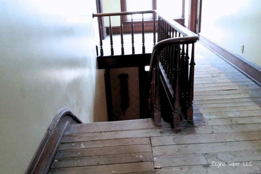 landing above stairs that needs to be repaired
