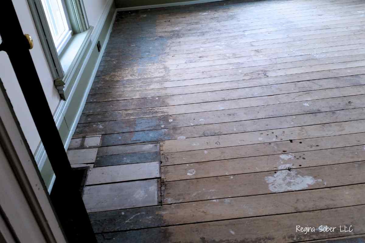 unfinished wood floors with patches