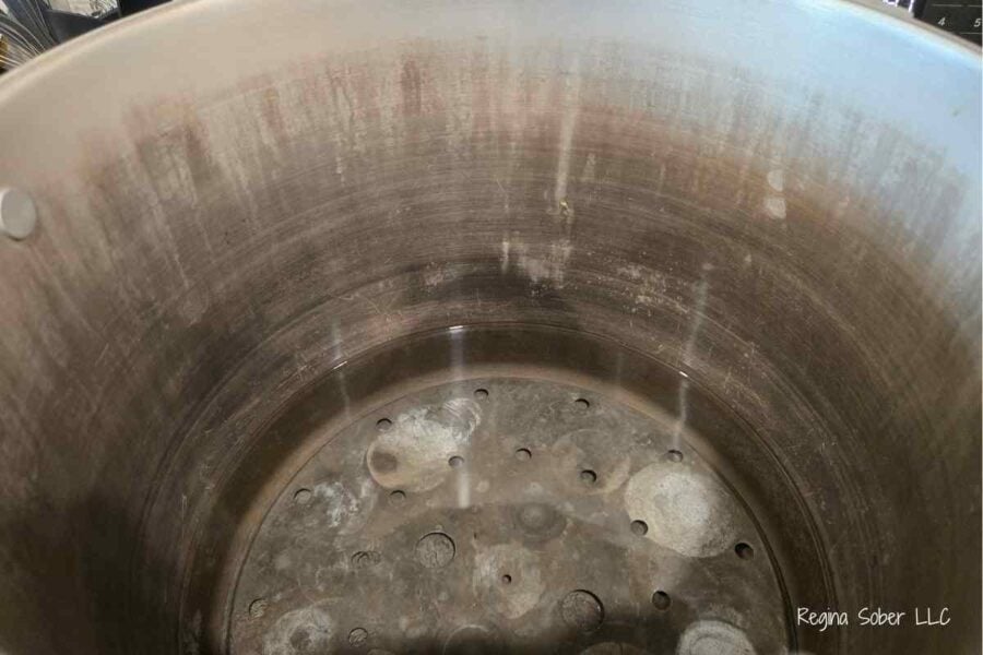 fill the pressure canner with at least 2 inches of water and heat