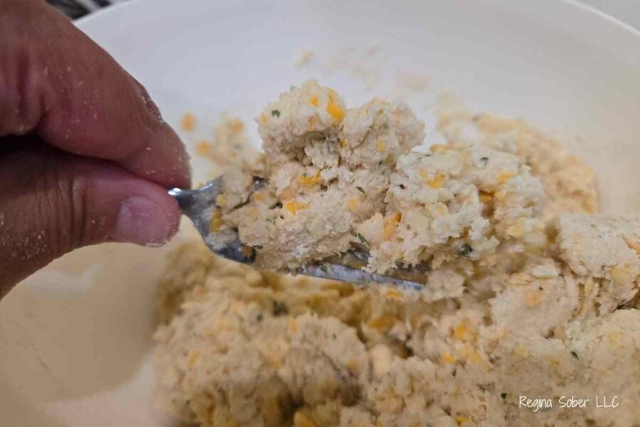 blend the ingredients in, add more milk if the biscuits are dry