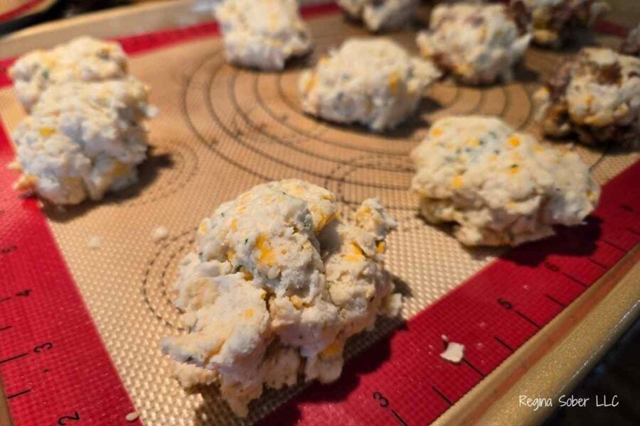 add the biscuits on to the baking sheet with a spoon
