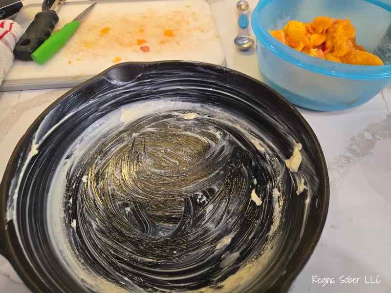 butter the cast iron well like this