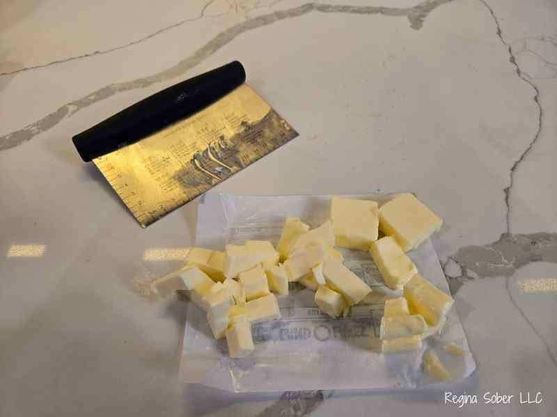 Use a stick of butter and reserve 2 Tablespoons and cube the rest