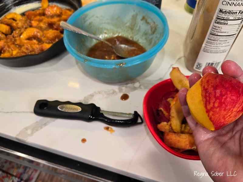Using a peeler to peel peaches