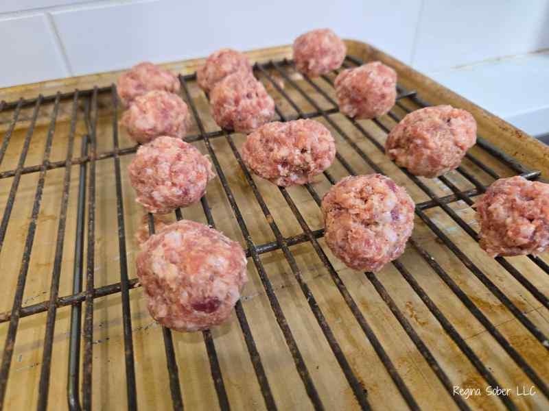 mini sausage balls on rack