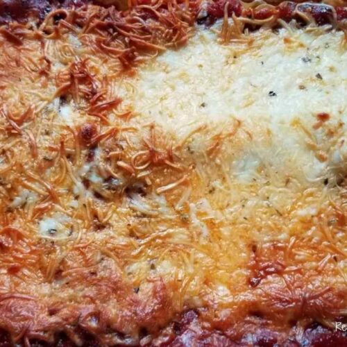 perfectly baked sausage lasagna with browned melted cheese
