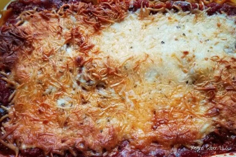 perfectly baked sausage lasagna with browned melted cheese