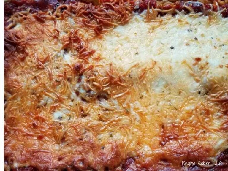 perfectly baked sausage lasagna with browned melted cheese