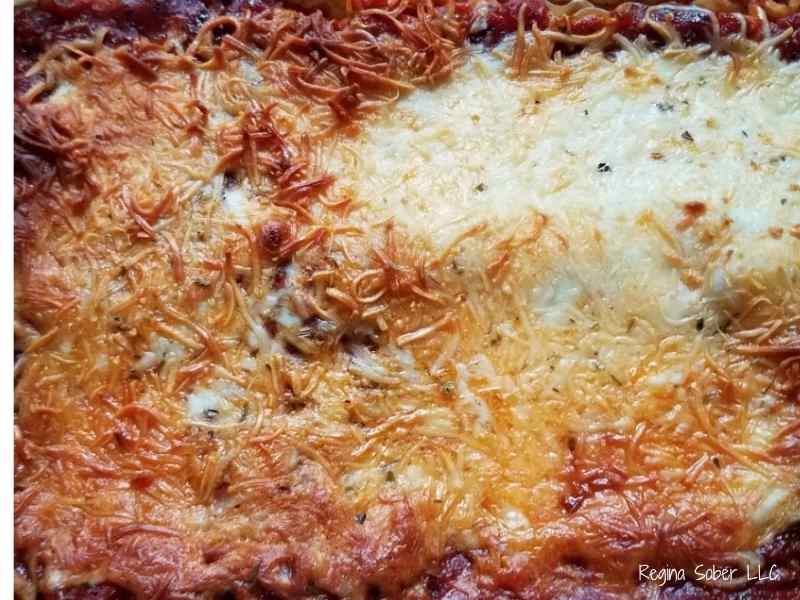 perfectly baked sausage lasagna with browned melted cheese