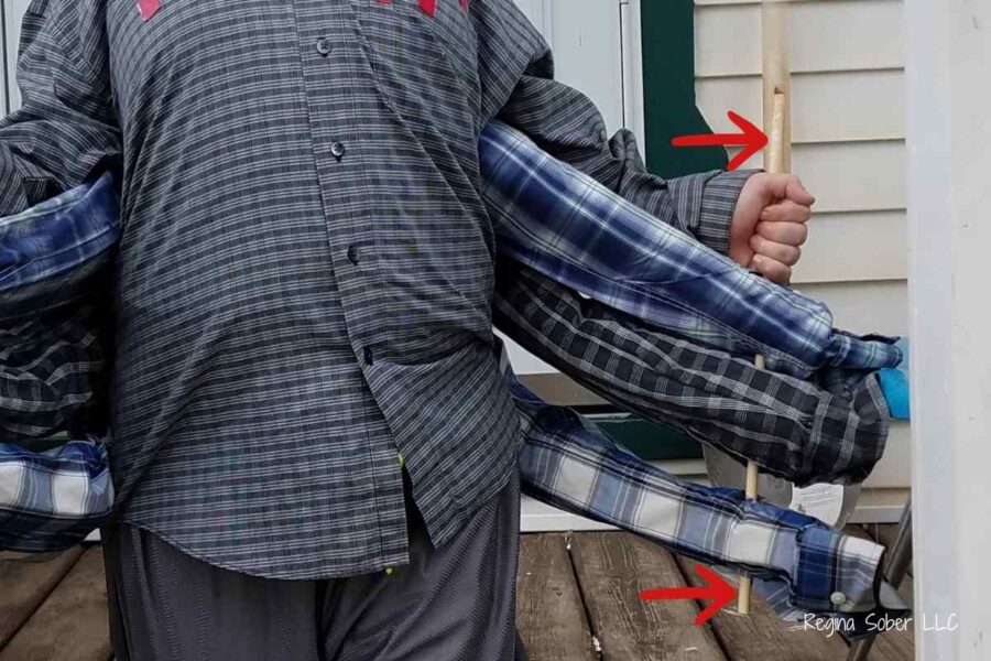 use dowels to control the arms and keep from falling backwards.