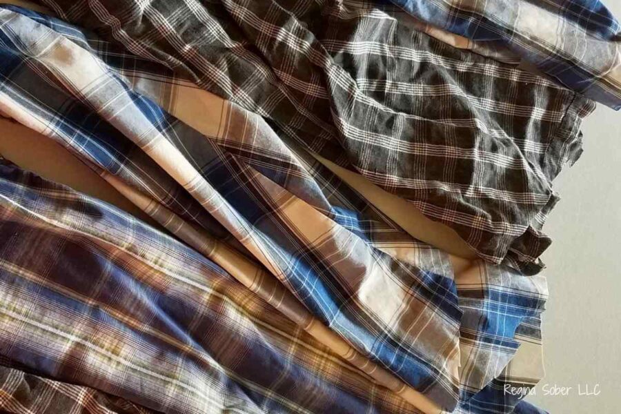 remove the sleeves of the shirt at the body of the shirt