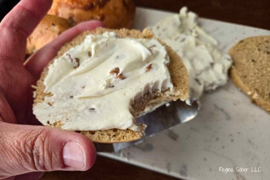generously spread the cream cheese on the bagels