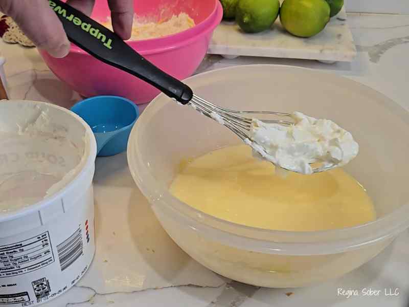 adding sour cream into muffin batter