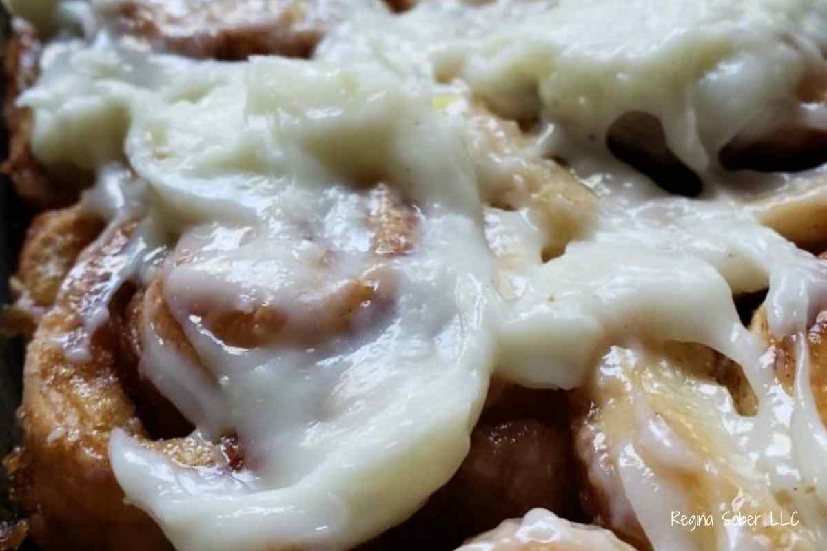 glazed cinnamon roll with cream cheese frosting