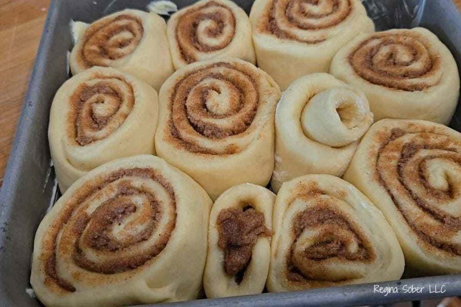 risen rolls in an 8x8 pan