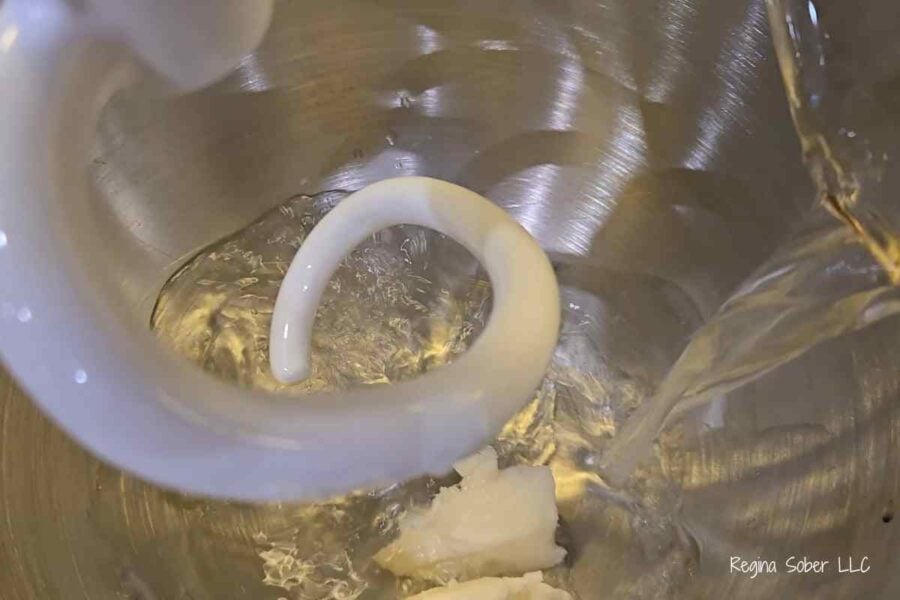 Adding shortening and water to mix