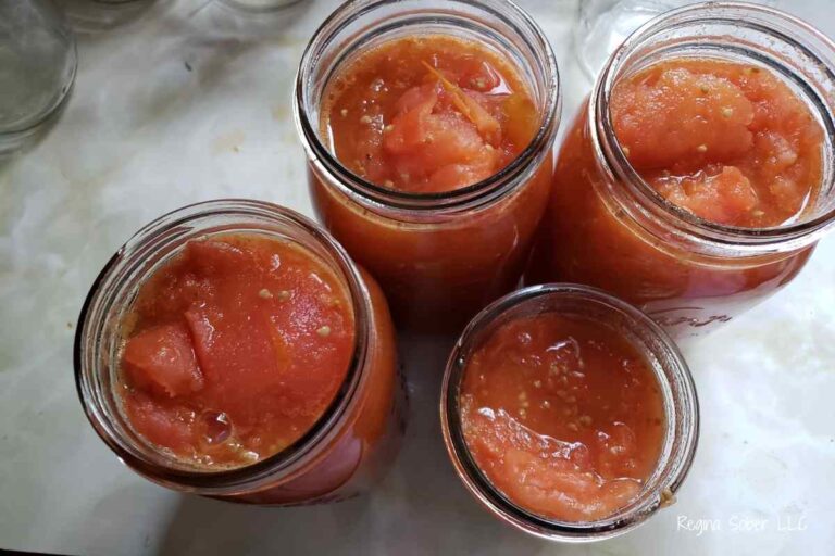 jarred tomatoes that are crushed and ready to be processed