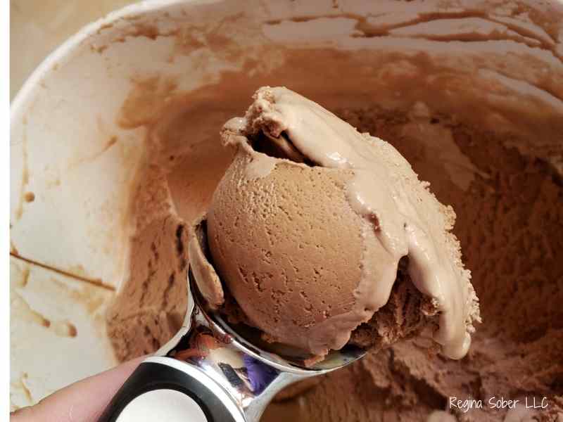 scooping ice cream to make sandwiches. homemade or store bought ice cream works
