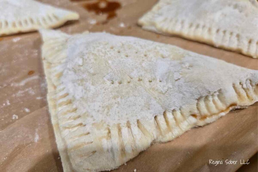use a fork to put holes in the pastry to keep the turnovers from bursting