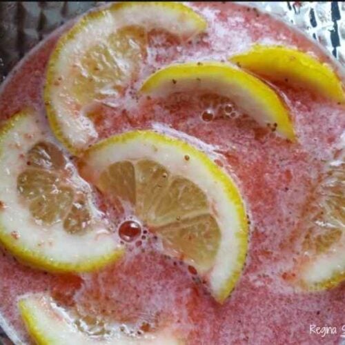strawberry lemonade with fresh lemon slices