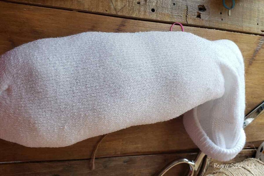 fill the sock with pillow stuffing