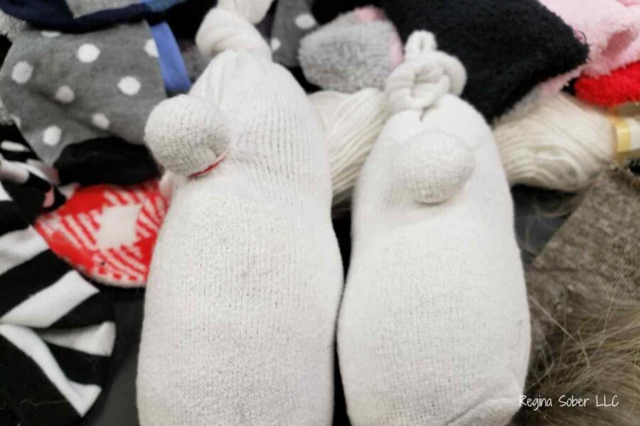 tie a knot at the top of the sock