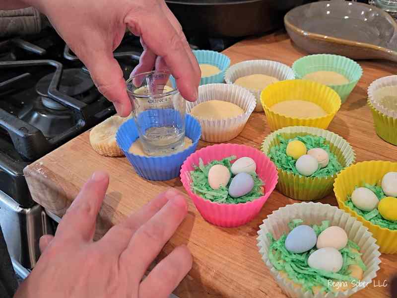 pressing cookies to make nest