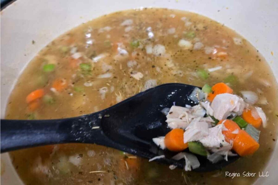 simmering chicken noodle soup to soften veggies