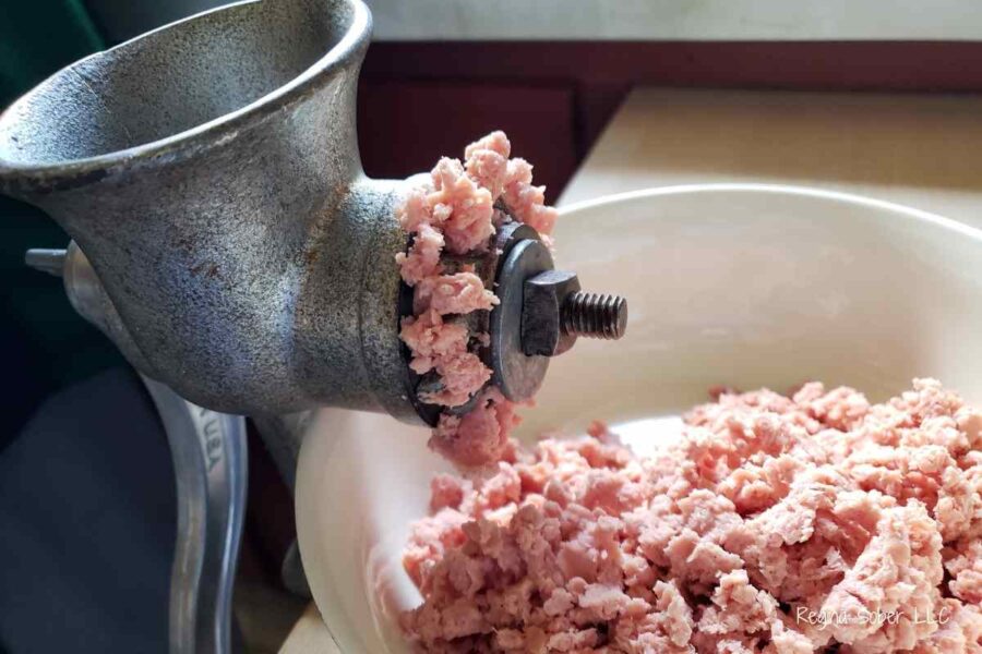 grinding bologna into a bowl
