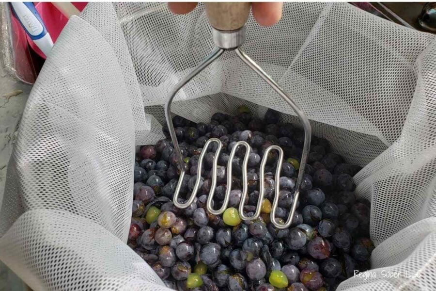 crushing grapes