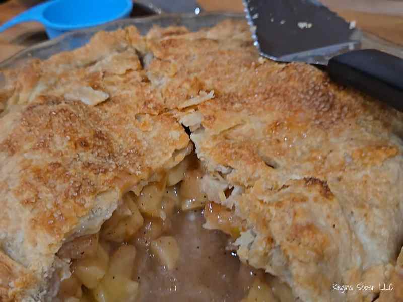 baked apple pie with sugar topped crust