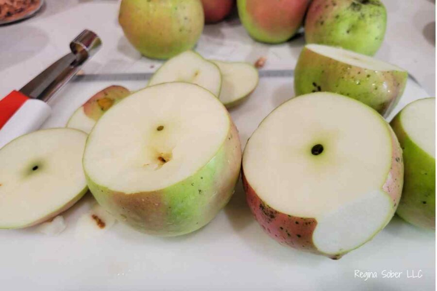 cut sweet apples on cutting board