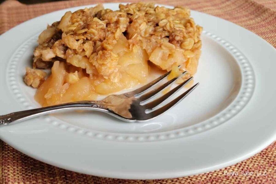 plate of apple crisp with fork