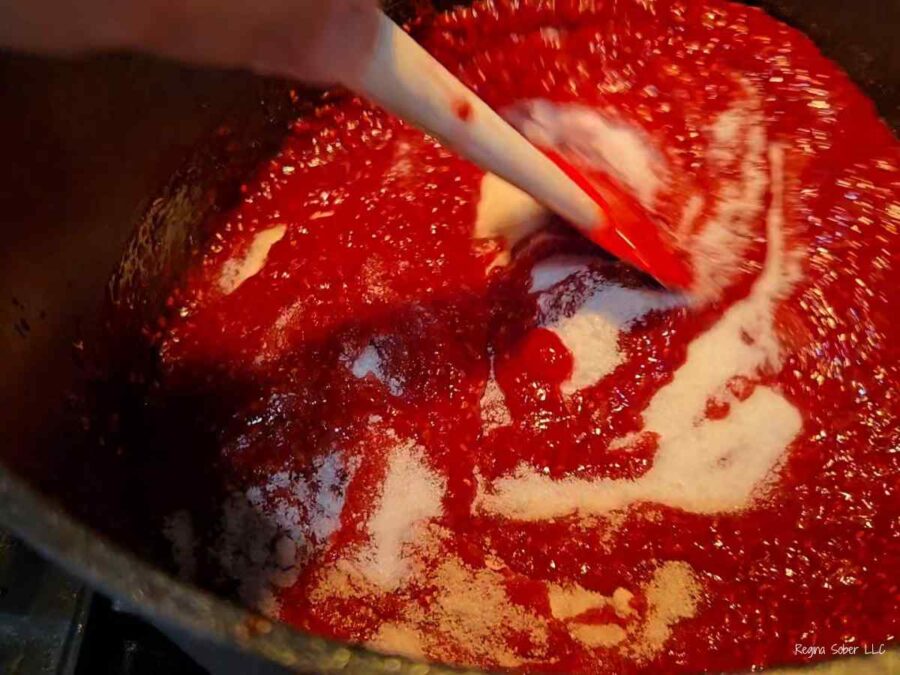 blending sugar into jam