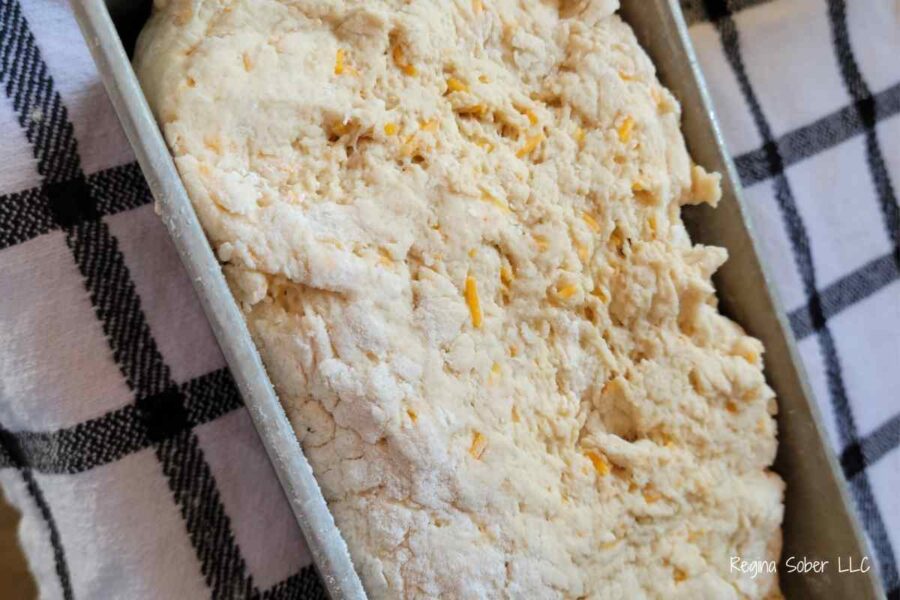 the dough will come just to the top of the loaf pan