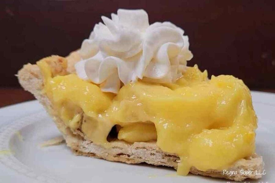 banana cream pie with whipped cream topping