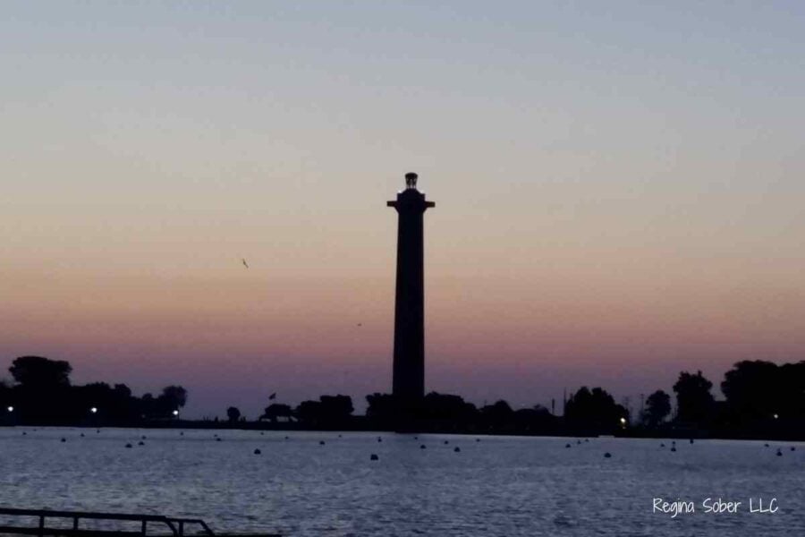 stay on the island get beautiful sunset views on the island like this of perry's monument